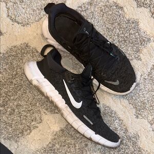 VERY WORN USED Nike free GYM shoes. Womens size 8.5 me s 7